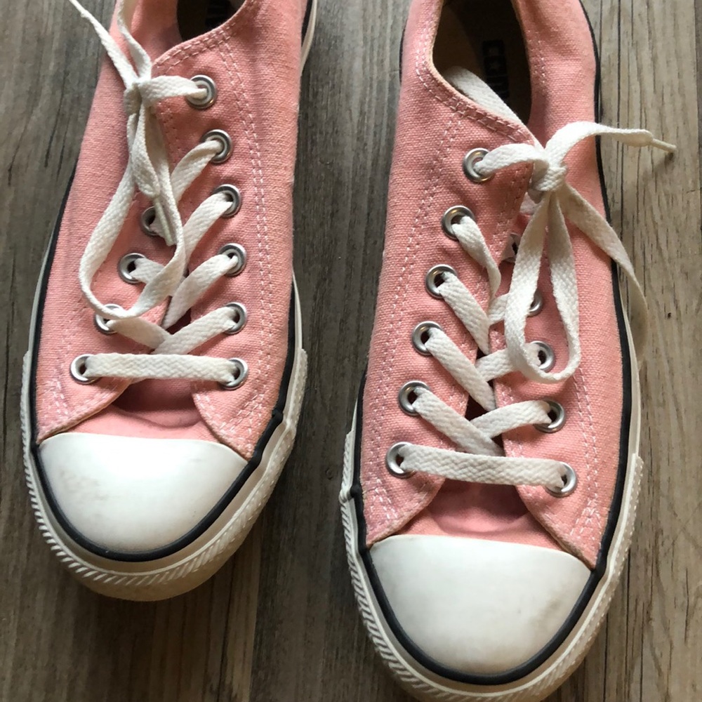 Pink and white converse sneakers
